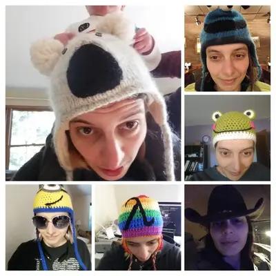 Susan's avatar wearing many different hats.